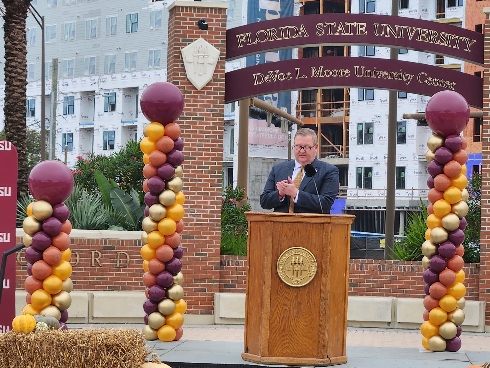 "Image of Kyle Clark standing at podium at F&A Appreciation event."